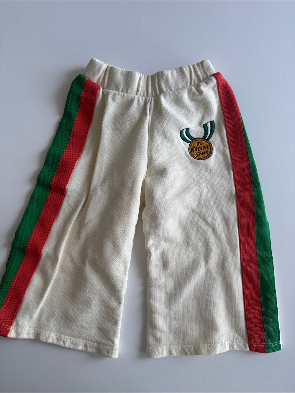 Mini Rodini Cream Track Pants with Red & Green Side Stripes